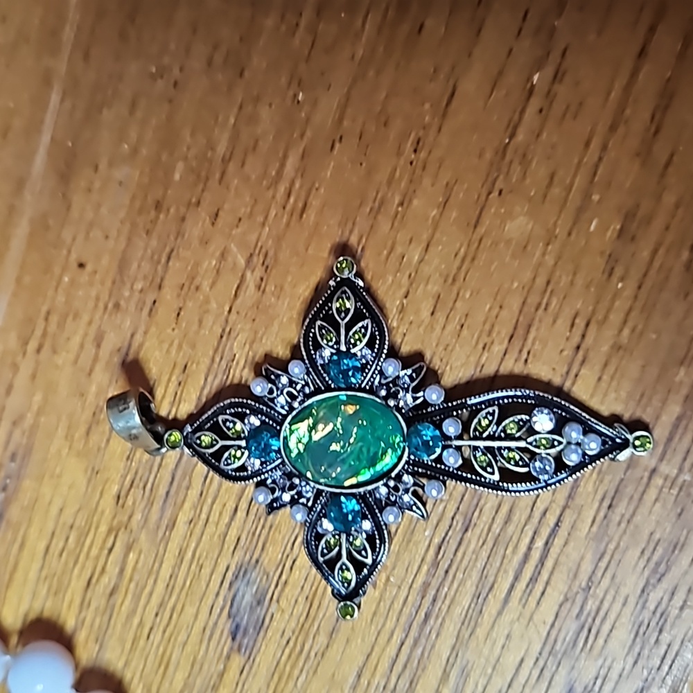 Brass coloured cross pendant